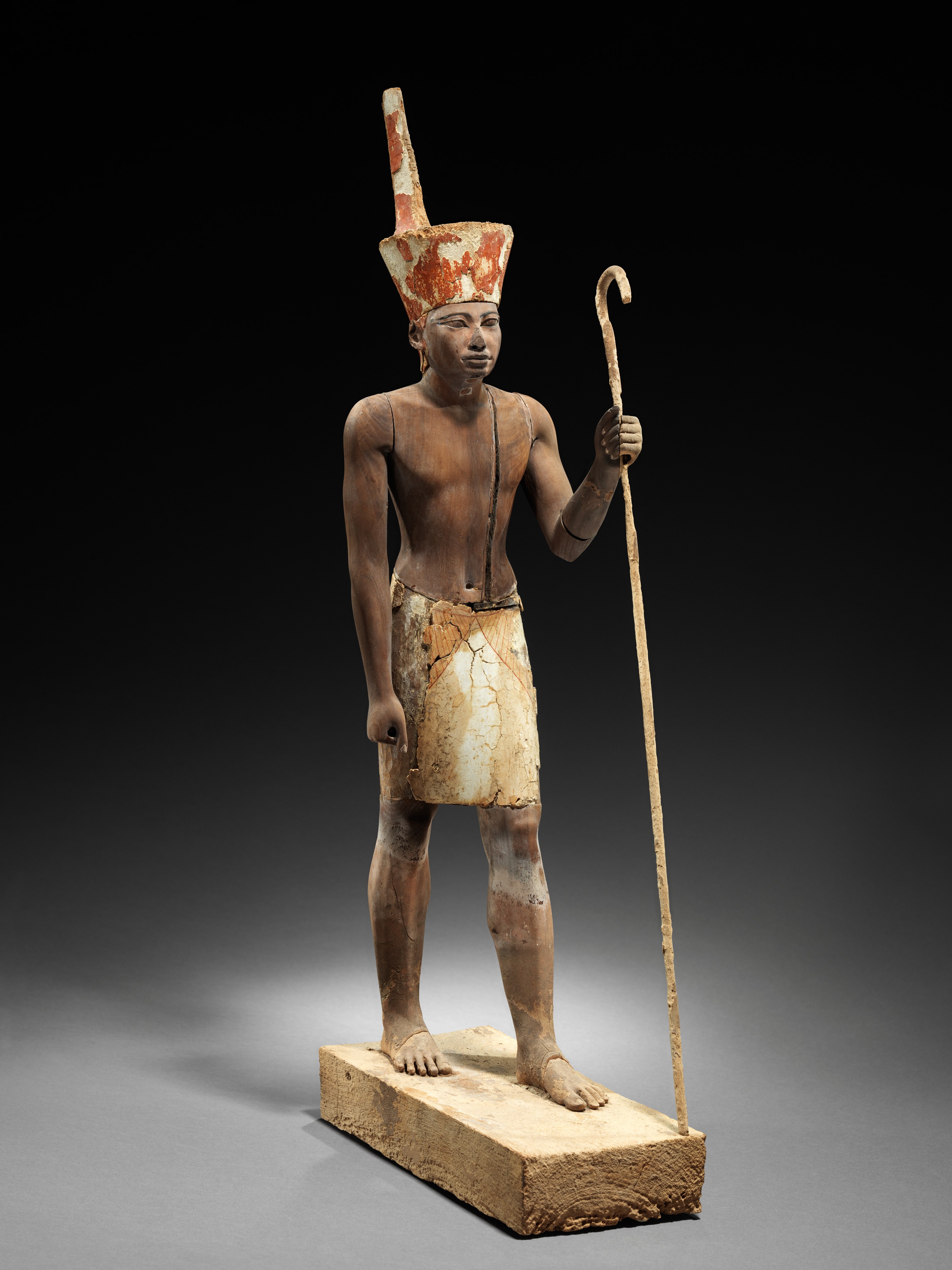 Funerary Guardian Figure, ca. 1919–1878 B.C. Egyptian, Middle Kingdom Cedar wood, plaster, paint ; H. 57.6 cm (22 11/16 in.); W. 11 cm (4 5/16 in.); D. 26 cm (10 1/4 in.) The Metropolitan Museum of Art, New York, Rogers Fund and Edward S. Harkness Gift, 1914 (14.3.17) http://www.metmuseum.org/Collections/search-the-collections/543864